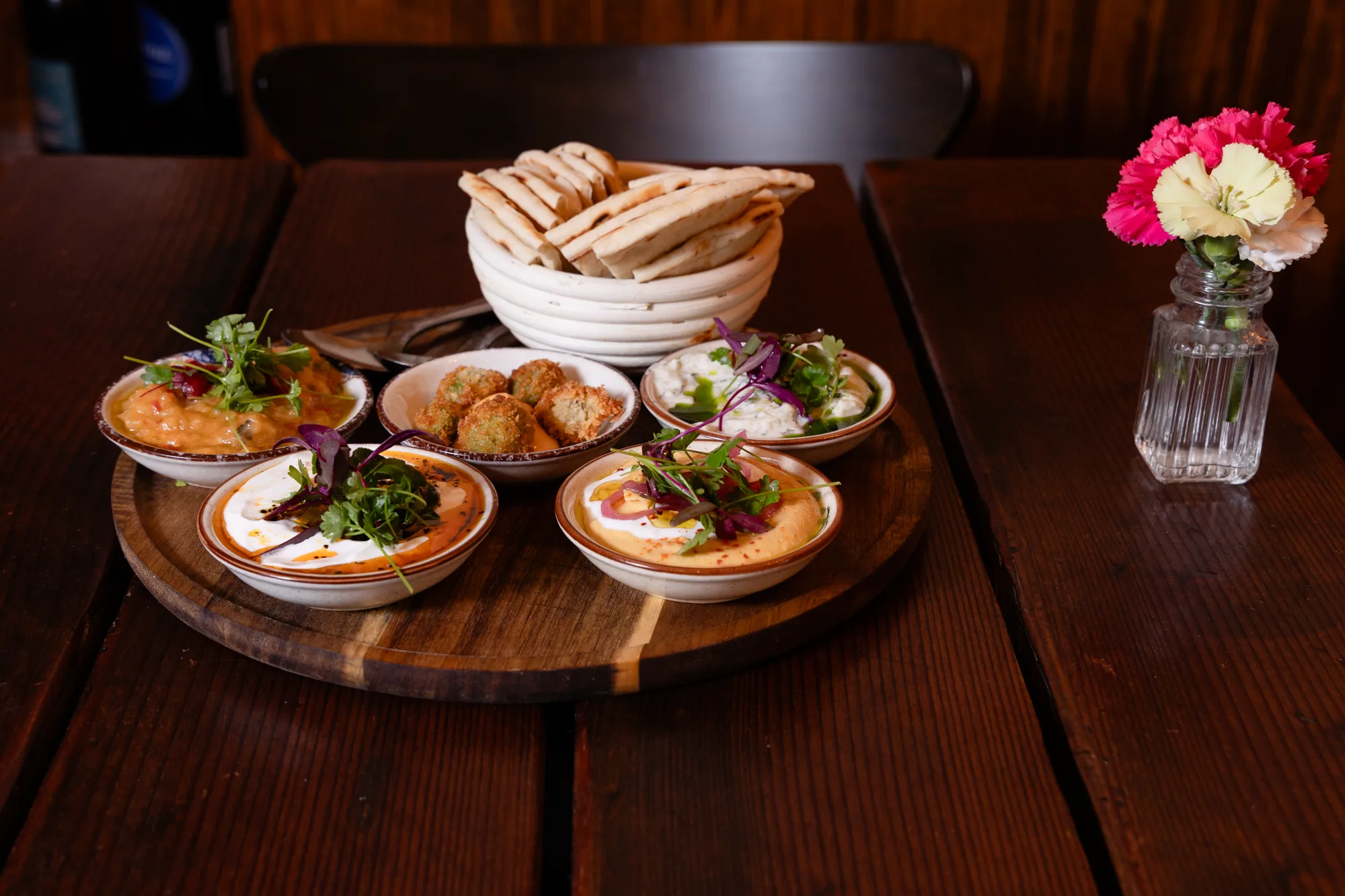 Alesta mezze spread with pita, hummus and falafel
