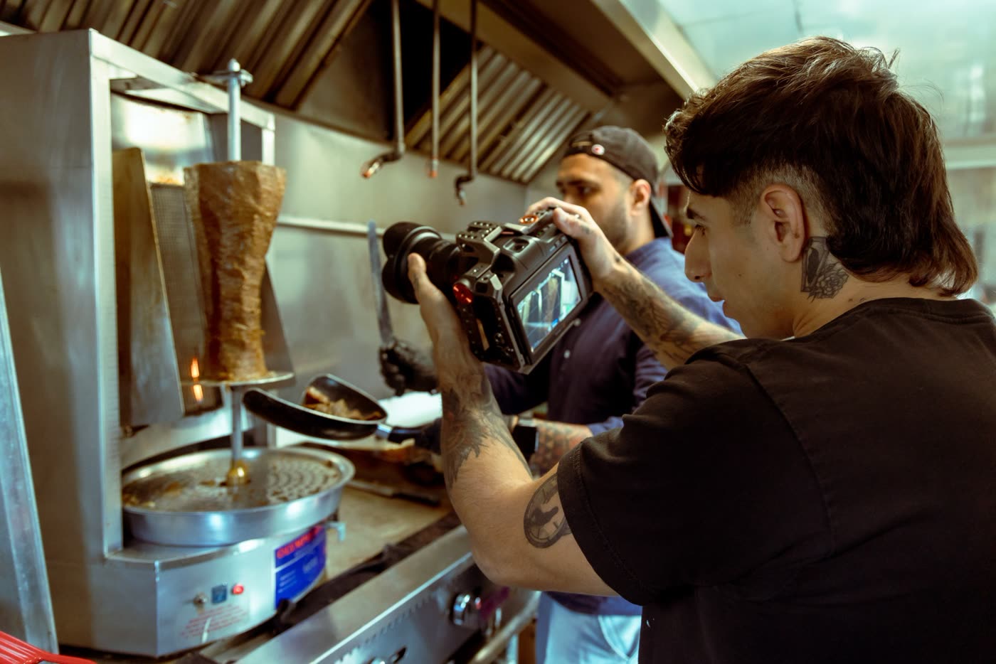 Filming the shawarma spit inside Aladdin's kitchen