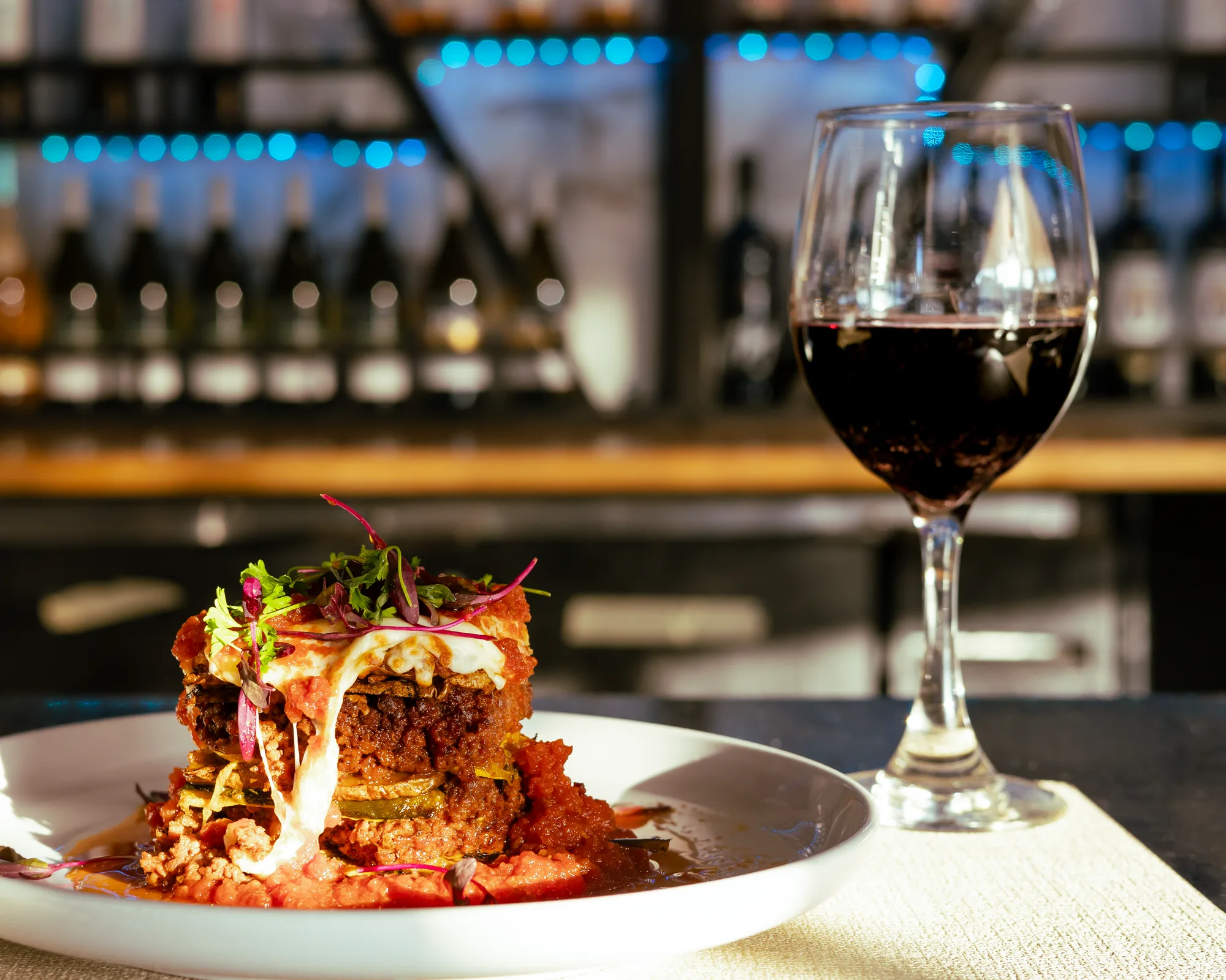 Kalimera moussaka with a glass of red wine